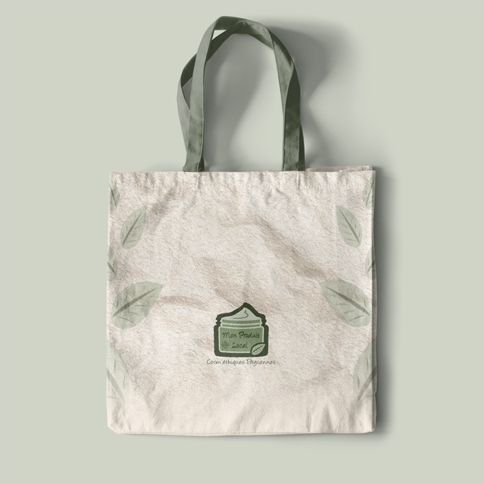 présentation de logo créé pour une boutique en ligne de cosmétiques locales sur un sac en toile
